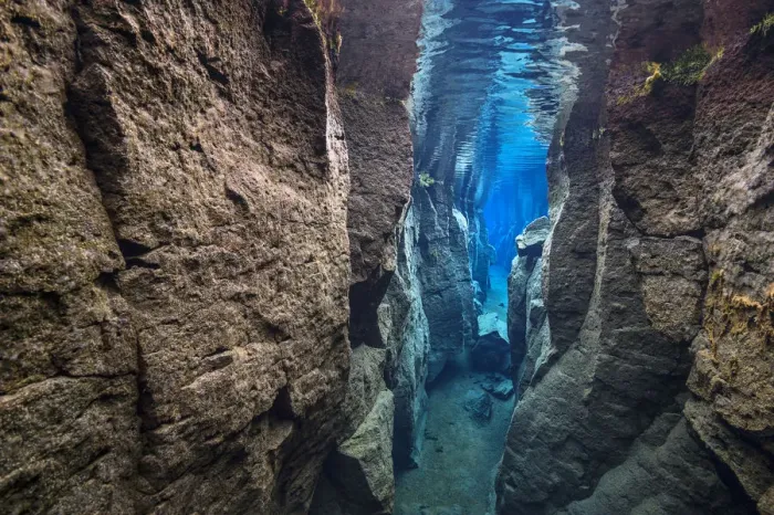 Framed Print : The narrow Nes Canyon, a fault filled with fresh water in the rift valley between the Eurasian