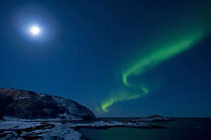 Framed Print : Northern lights in moonlit sky, northern Finland, March 2009