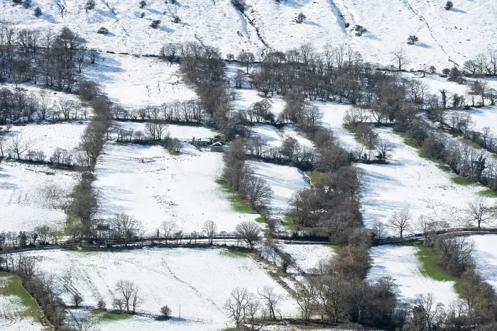 Framed Print : The Olchon Valley with small fields and hedges with trees of Celtic origins, viewed from Black Hill / Cat's Back, Herefordshire, England, UK. March, 2024