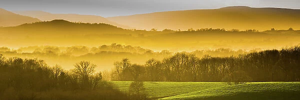 Panoramic landscape of countryside at sunset, Monmouthshire, Wales, UK, March 2017