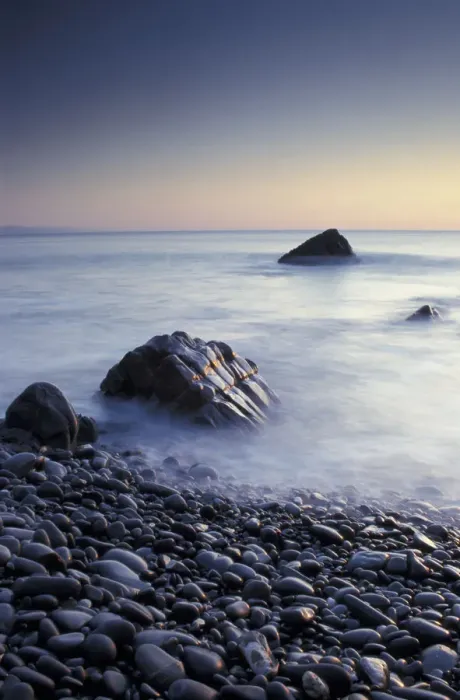 Framed Print : Pebbles and surf on beach at dusk, Sandymouth bay, Cornwall, UK Framed Print : Pebbles and surf on beach at dusk, Sandymouth bay, Cornwall, UK