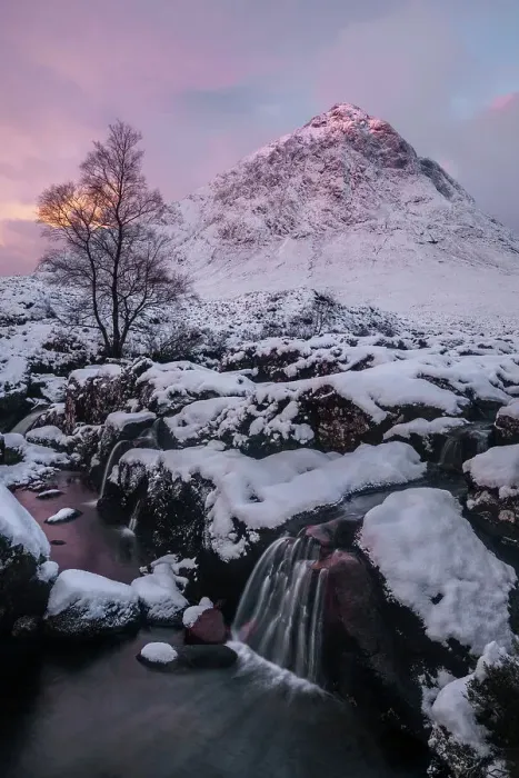 Framed Print : Pink sky at sunrise over a snow-covered landscape and highland stream, with a view to Buachaille Etive Mor, Glencoe, Scotland. November, 2017 Framed Print : Pink sky at sunrise over a snow-covered landscape and highland stream, with a view to Buachaille Etive Mor, Glencoe, Scotland. November, 2017