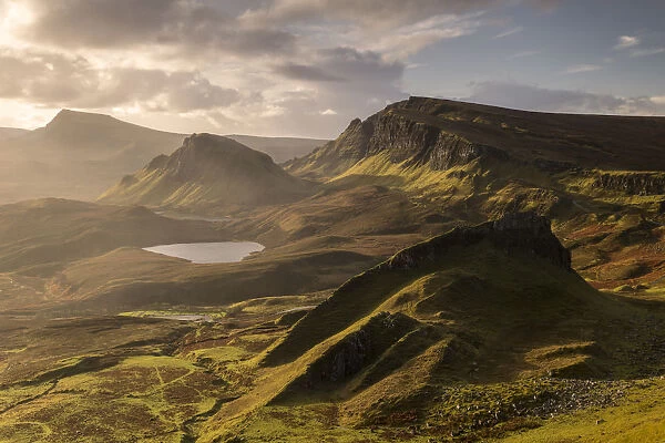 The Quiraing bathed in morning light, eastern face of Meall na Suiramach, the northernmost summit of the Trotternish on the Isle of Skye, Scotland, UK. November 2017