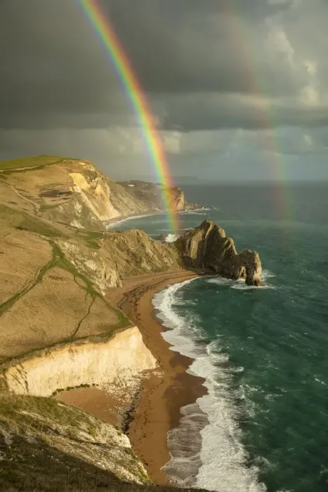Framed Print : Rainbow over Durdle Door and the Jurassic Coast, Dorset, England, UK. October 2019 Framed Print : Rainbow over Durdle Door and the Jurassic Coast, Dorset, England, UK. October 2019