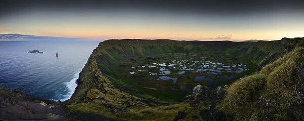 Rano Kau Volcano crater with lagoon and Motu islets in the sea, Easter Island, Pacific ocean