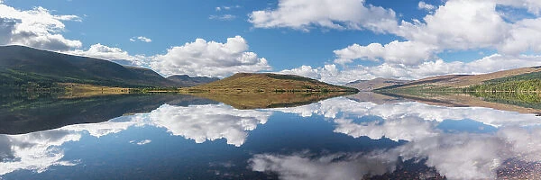 Reflections of clouds and landscape in Loch Arkaig, Glen Dessary, Lochaber, Scotland, UK, September 2016