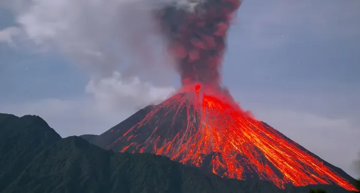 Framed Print : Reventador Volcano erupting at night, red hot boulders ejected from crater rolling down Framed Print : Reventador Volcano erupting at night, red hot boulders ejected from crater rolling down