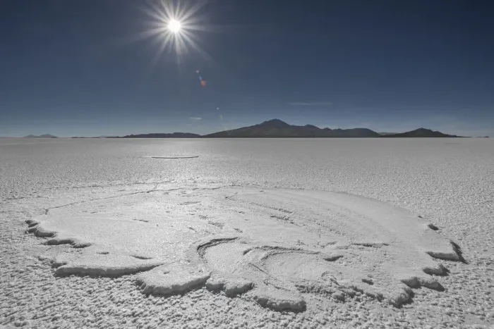 Framed Print : RF- Landscape of salt pan with sun high above, Salar de Uyuni, Altiplano, Bolivia Framed Print : RF- Landscape of salt pan with sun high above, Salar de Uyuni, Altiplano, Bolivia