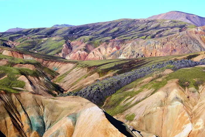 Framed Print : RF - View of rhyolite mountains and solidified lava fields, Landmannalaugar volcanic massif, Fjallabak Nature Reserve, Iceland. September, 2023