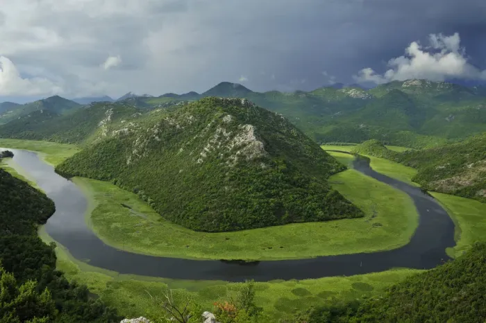 Framed Print : River Crnojevica with a central channel between aquatic plants, flowing round Pavlova Strana