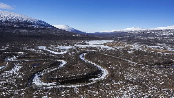 River meandering through remote valley, Putoransky State Nature Reserve, Putorana Plateau, Siberia, Russia. May, 2021