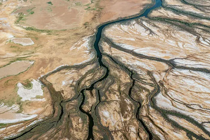 Framed Print : Rivers / water channels form and water flows into Lake Eyrer North as a result of uncommonly high desert rainfall. Lake Eyre North, South Australia, March 2022 Framed Print : Rivers / water channels form and water flows into Lake Eyrer North as a result of uncommonly high desert rainfall. Lake Eyre North, South Australia, March 2022