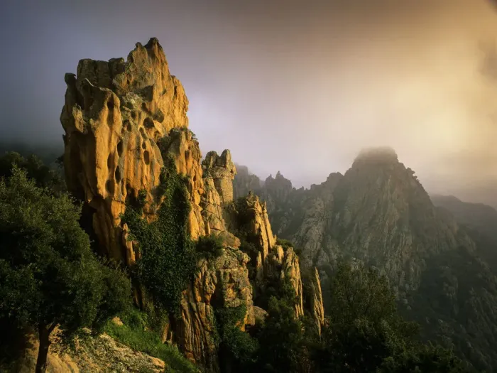 Framed Print : Rock formations in the fog at sunset, in the Calanche of Piana, Gulf of Porto UNESCO Framed Print : Rock formations in the fog at sunset, in the Calanche of Piana, Gulf of Porto UNESCO