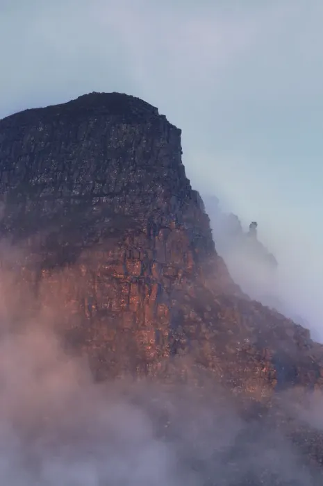 Framed Print : The rugged cliffs of Stac Pollidh in cloud and mist and lit by evening light Framed Print : The rugged cliffs of Stac Pollidh in cloud and mist and lit by evening light