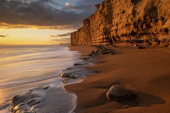Framed Print : Sandstone cliffs at sunset, Burton Bradstock, Jurassic Coast World Heritage Site, Dorset, England, UK. February, 2023 Framed Print : Sandstone cliffs at sunset, Burton Bradstock, Jurassic Coast World Heritage Site, Dorset, England, UK. February, 2023