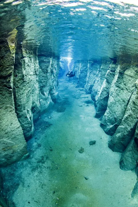 Framed Print : Scuba diver exploring volcanic crack Nesgja, in Asbyrgi National Park, northern Iceland Framed Print : Scuba diver exploring volcanic crack Nesgja, in Asbyrgi National Park, northern Iceland