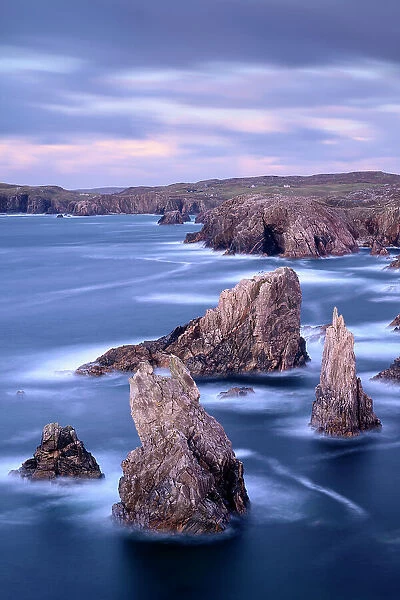 Sea stacks at Mangurstadh Beach, Isle of Lewis and Harris, Outer Hebrides, Scotland, UK, Atlantic Ocean. November