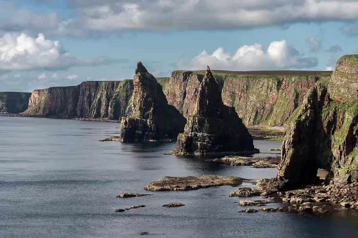 Framed Print : Sheer cliffs and sea stacks at Duncansby Head, Caithness, northern Scotland, UK. July, 2017 Framed Print : Sheer cliffs and sea stacks at Duncansby Head, Caithness, northern Scotland, UK. July, 2017