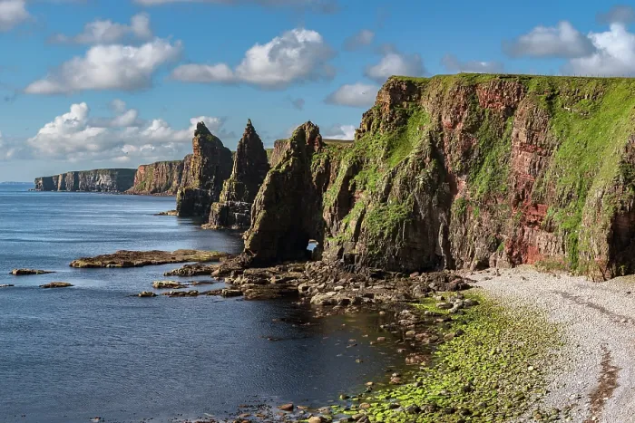 Framed Print : Sheer cliffs and sea stacks at Duncansby Head, Caithness, northern Scotland, UK. July, 2017 Framed Print : Sheer cliffs and sea stacks at Duncansby Head, Caithness, northern Scotland, UK. July, 2017