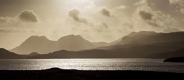 Silhouettes of hills over Loch Lurgainn, looking towards Ben Mor Coigach, Assynt