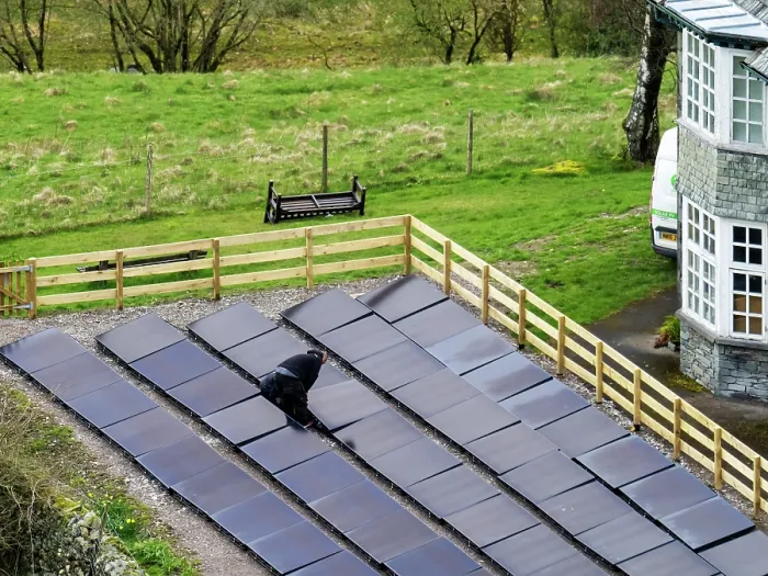 Framed Print : Solar panels in the grounds of a business in Ambleside, Lake District, Cumbria, UK. April, 2023