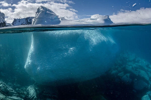 Split level view of an iceberg, Kinnes Cove, Joinville Island, Antarctica Peninsula, Southern Ocean