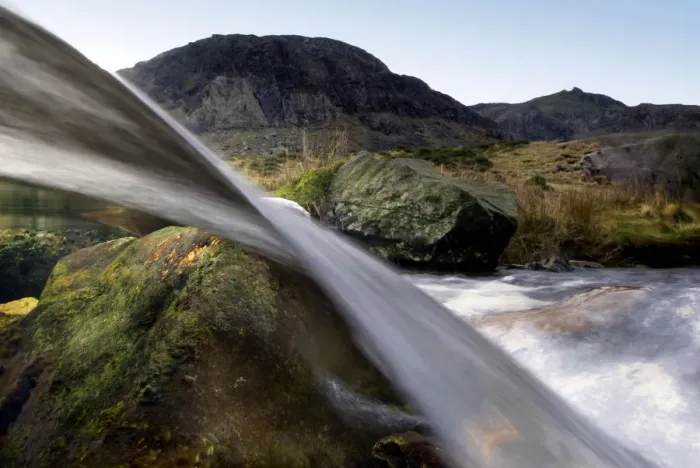Framed Print : A split-level view through a small waterfall, Llanberis, Snowdonia NP, Gwynedd, Wales Framed Print : A split-level view through a small waterfall, Llanberis, Snowdonia NP, Gwynedd, Wales