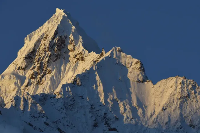 Framed Print : Sun shining at the Miancimu Peak, 6054 m, in the Meili Snow Mountain National park, Yunnan, China