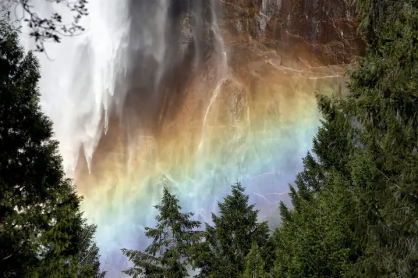 Sunlight Creating A Rainbow In The Spray Of The Bridalveil