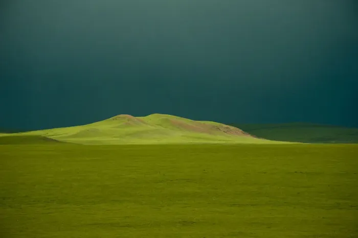 Framed Print : Sunlight on grassland from Qinghaia'Tibet  /  Qingzang railway, the worlds highest railway