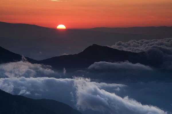 Sunrise in the Julian Alps viewed from Mount Kriz, Triglav National Park, Slovenia