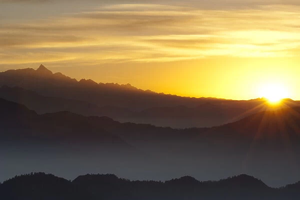 Sunrise over mountains, viewpoint from Tharepati, Helambu region, Nepal, November 2009