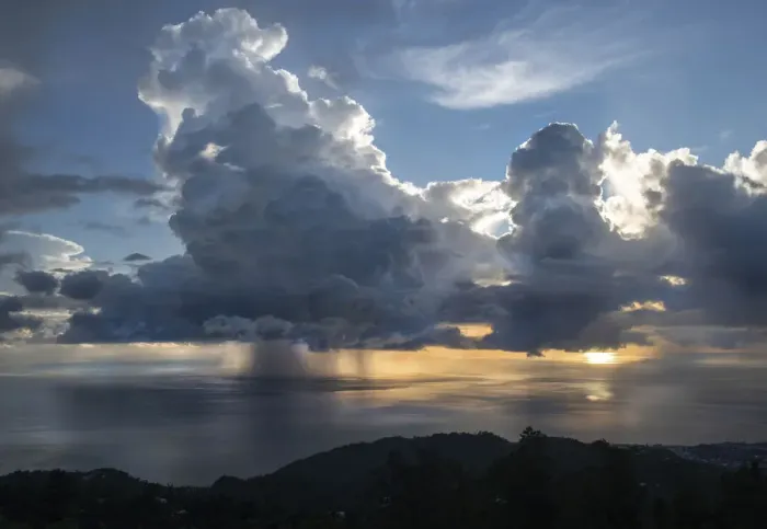Framed Print : Sunset with dramatic rain clouds during hurricane season. Dominica, West Indies Framed Print : Sunset with dramatic rain clouds during hurricane season. Dominica, West Indies