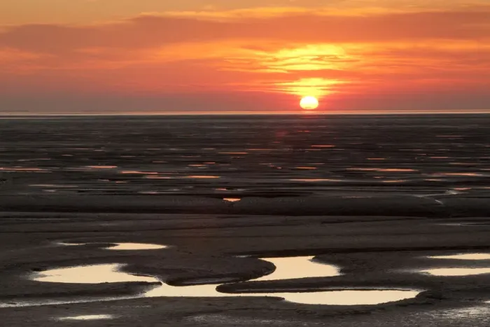 Framed Print : Sunset reflected from mudflats. The Wash Estuary, Norfolk, October 2011