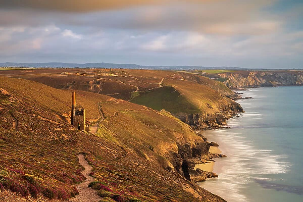 Towanroath Engine House of Wheal Coates in stormy evening light, view of coast. Cornwall, UK, August