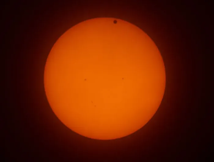 Framed Print : The transit of Venus across the face of the sun, with visible sunspots, as seen from Aurora Framed Print : The transit of Venus across the face of the sun, with visible sunspots, as seen from Aurora