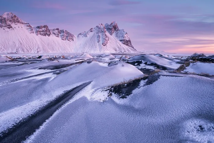 Framed Print : Vestrahorn mountain and sand dunes covered in snow at sunrise, Stokksnes Peninsula, Iceland. January, 2024 Framed Print : Vestrahorn mountain and sand dunes covered in snow at sunrise, Stokksnes Peninsula, Iceland. January, 2024