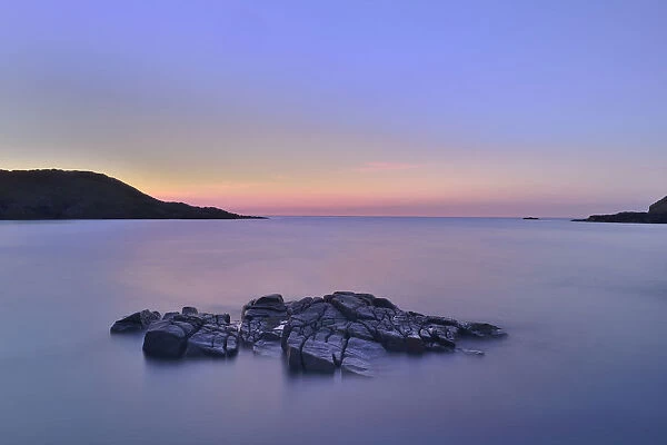 View from Altweary Bay to Melmore Head, Rosguill Peninsula at dusk, County Donegal