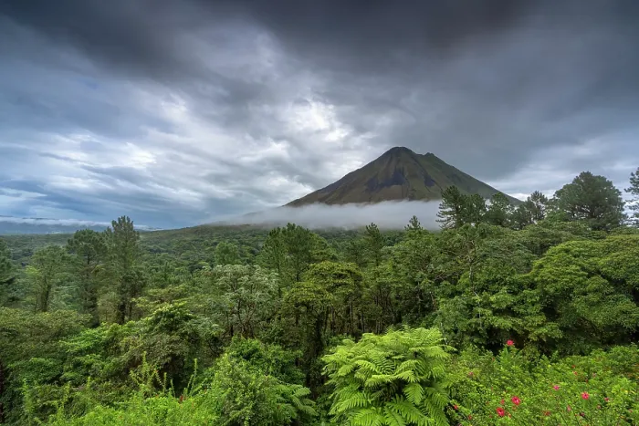 Framed Print : View of Arenal volcano and surrounding rainforest, Arenal, Costa Rica. August, 2023