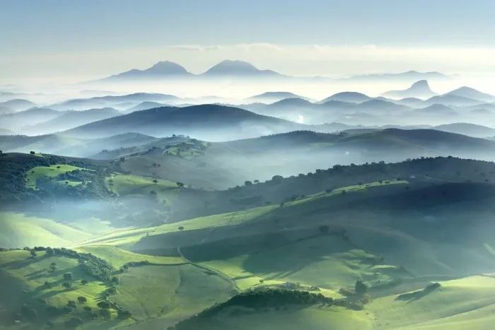 Framed Print : View of fields and mountains in the mist at dawn, Montellano, Seville, Spain