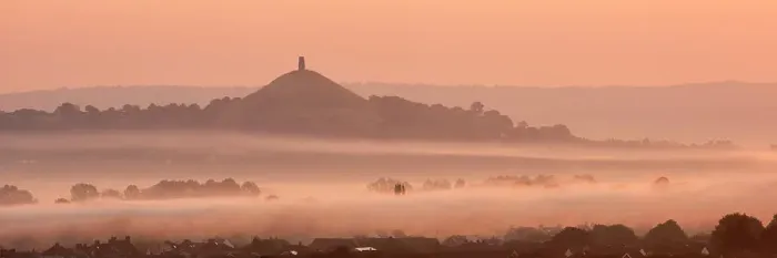 Framed Print : View towards Glastonbury Tor with low lying mist at sunrise from Waltons Hill, Glastonbury, Somerset, UK, August 2013 Framed Print : View towards Glastonbury Tor with low lying mist at sunrise from Waltons Hill, Glastonbury, Somerset, UK, August 2013