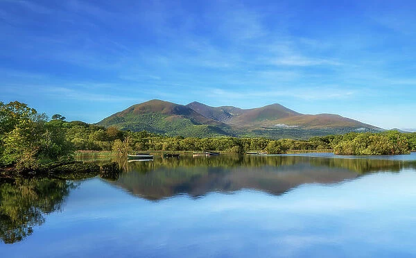 View of Macgillycuddy's Reeks mountain range and Lough Leane from Ross Castle, Killarney, County Kerry, Republic of Ireland. September, 2022