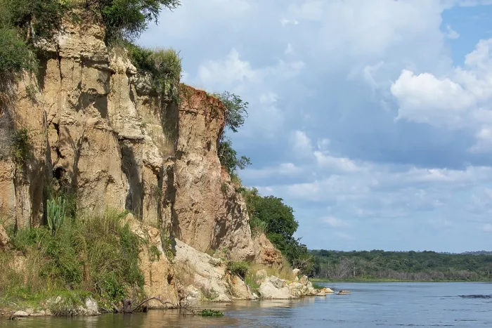 Framed Print : View of steep cliffs along riverbank and Nile River, Murchison Falls National Park, Uganda. November, 2022 Framed Print : View of steep cliffs along riverbank and Nile River, Murchison Falls National Park, Uganda. November, 2022