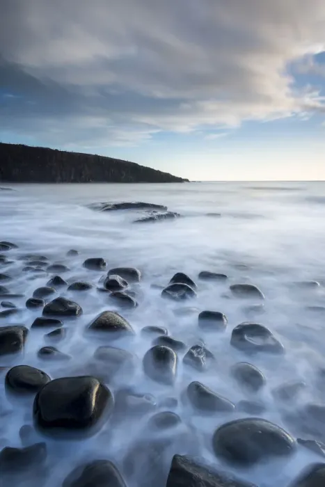 Framed Print : Waves washing over the rocks, Cullernose Point at dawn, Northumberland, UK. March 2014