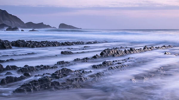 Welcombe Mouth at high tide, evening light, taken with long exposure, Welcombe, North Devon, UK. April