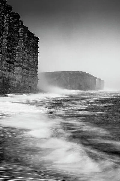 West Bay on a murky winter morning, Jurassic Coast, Dorset, England, UK. December 2020