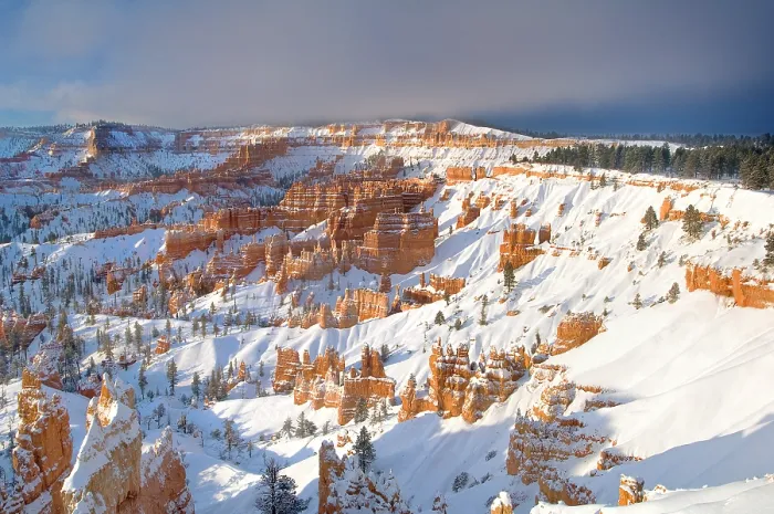 Framed Print : A winter sunrise over snow covered red standstone hoodoos viewed from Sunset Point, Bryce Canyon National Park, Utah, USA. March, 2008 Framed Print : A winter sunrise over snow covered red standstone hoodoos viewed from Sunset Point, Bryce Canyon National Park, Utah, USA. March, 2008