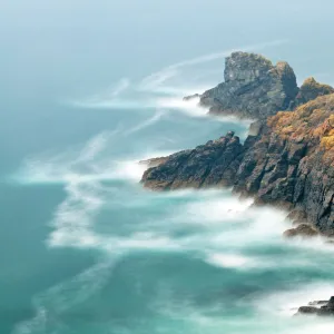 Abandoned tin mineshafts above rugged coastal rocks. Botallack Head, near St Just