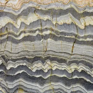 Détail de motif abstrait dans la roche grise, Kintra, Islay, Écosse. Détail de motif abstrait dans la roche grise, Kintra, Islay, Écosse.