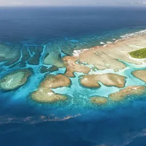Aerial panorama of Maninita Island which sits atop an extensive coral reef structure, which is for the most part not visible from the surface of the ocean. The reefs extend into the smaller island of Fonuafo'ou in the background Aerial panorama of Maninita Island which sits atop an extensive coral reef structure, which is for the most part not visible from the surface of the ocean. The reefs extend into the smaller island of Fonuafo'ou in the background